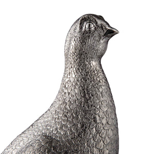 silver grouse figurine